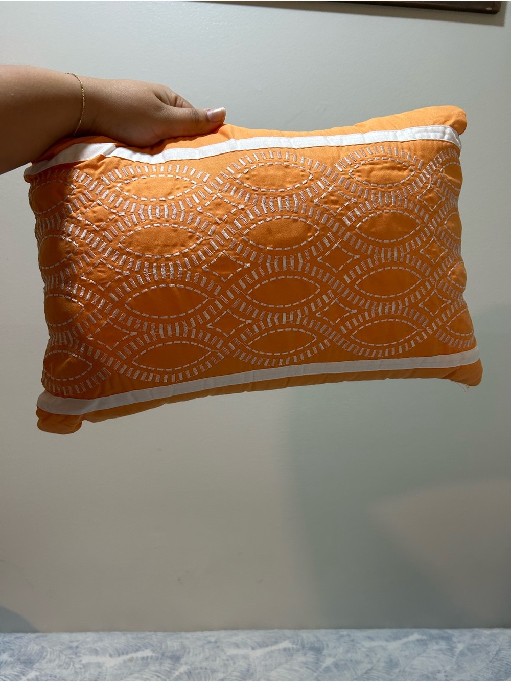 Orange Decorative Throw Pillow with White Embroidered Pattern